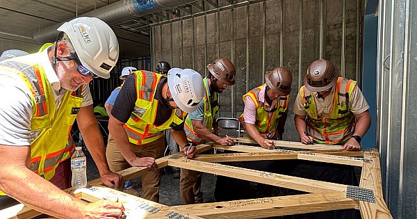 Messages of Hope at One80 Place Beam Signing