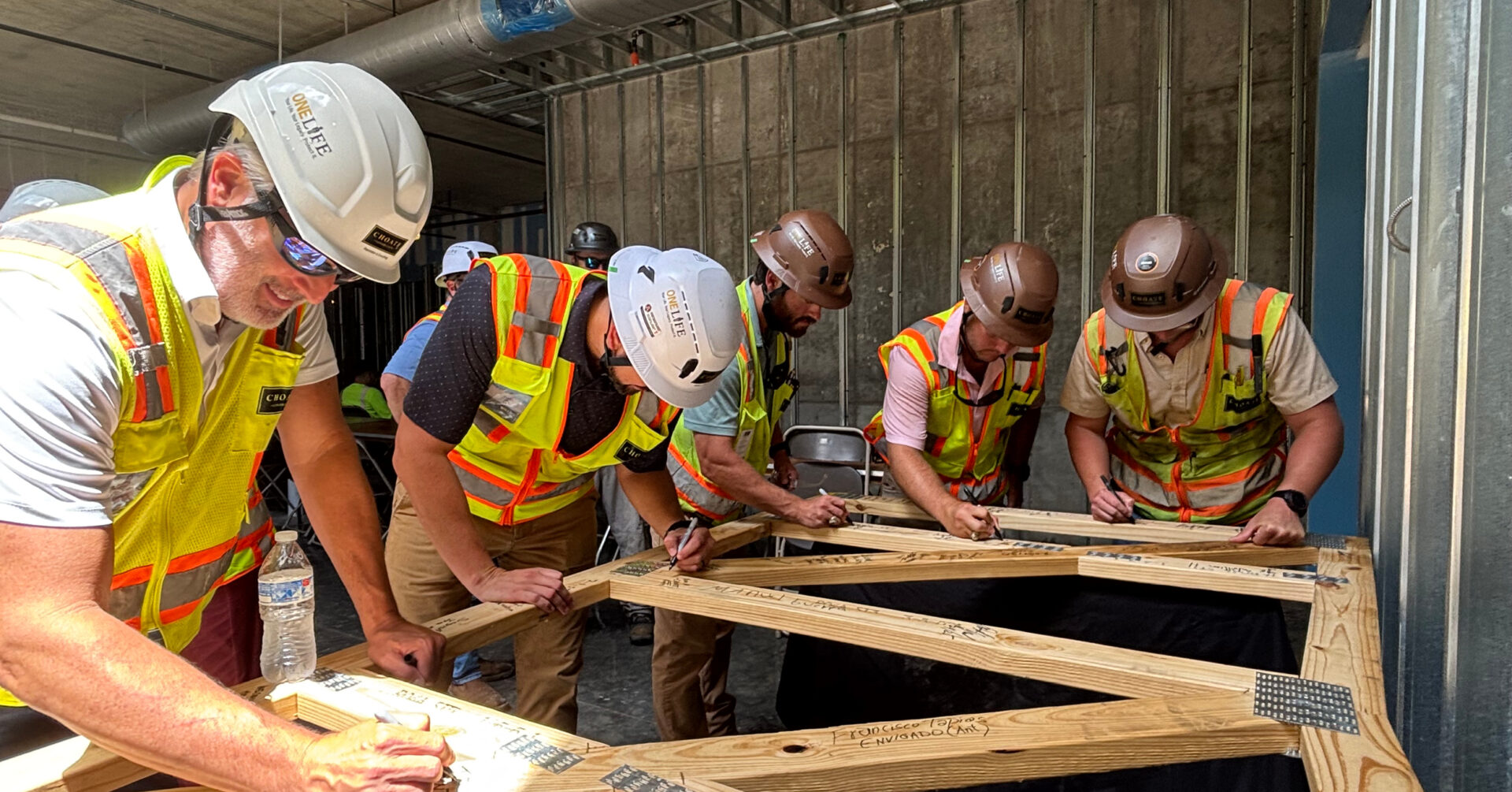 Messages of Hope at One80 Place Beam Signing